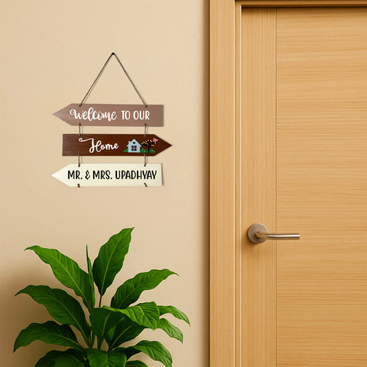 Welcome To Our Home Hand-Painted Wooden Three Arrow Plank Name Plate For Home - Brown
