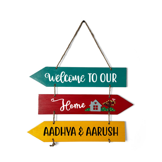 Welcome To Our Home Hand-Painted Wooden Three Arrow Plank Name Plate For Home - Multicolor